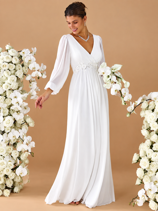 Amalia | Vestido de novia largo cruzado con mangas abullonadas y aplique floral en la cintura